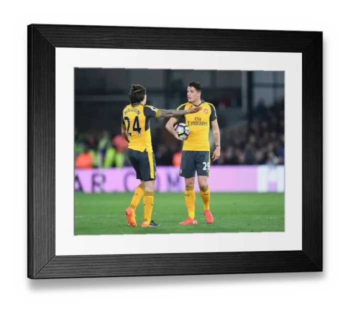 Framed Print : Arsenal's Midfield Dynamos: Bellerin and Xhaka in Action