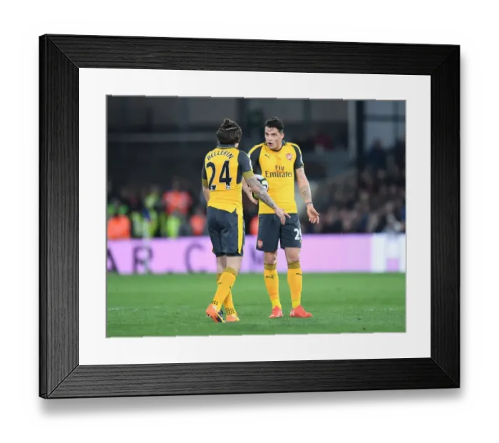 Framed Print : Arsenal's Midfield Dynamo: Bellerin and Xhaka in Action