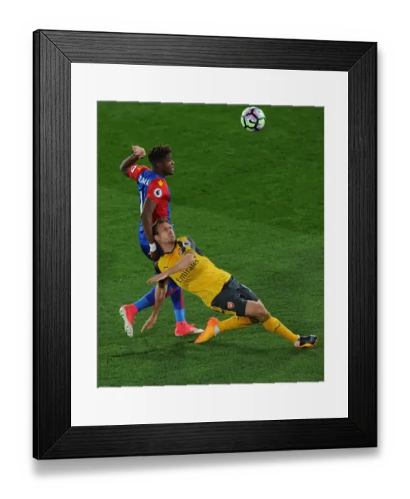 Framed Print : Nacho Monreal (Arsenal) Wilfred Zaha (Palace). Crystal Palace 3: 0 Arsenal. Premier League Framed Print : Nacho Monreal (Arsenal) Wilfred Zaha (Palace). Crystal Palace 3: 0 Arsenal. Premier League