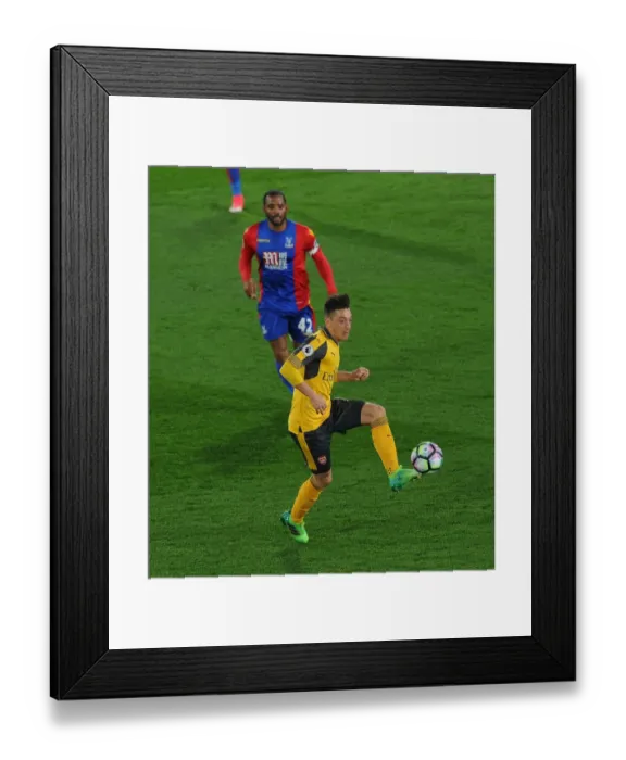 Framed Print : Mesut Ozil vs Jason Puncheon: Intense Battle at Selhurst Park - Crystal Palace vs Arsenal, Premier League 2016-17 Framed Print : Mesut Ozil vs Jason Puncheon: Intense Battle at Selhurst Park - Crystal Palace vs Arsenal, Premier League 2016-17