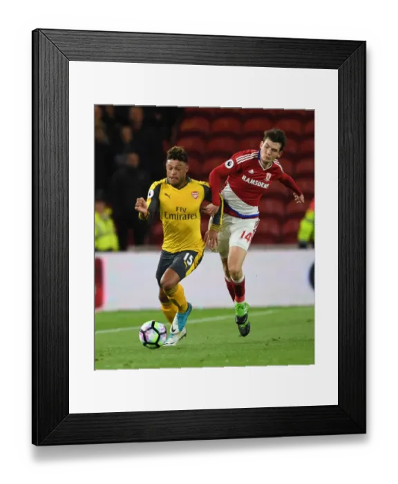 Framed Print : Clash of Midfielders: Oxlade-Chamberlain vs. de Roon - Middlesbrough vs. Arsenal, Premier League 2016-17
