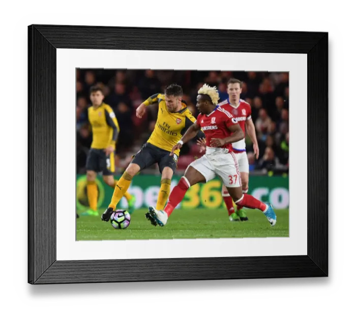 Framed Print : Clash of Wings: Ramsey vs. Traore in Middlesbrough's Premier League Battle against Arsenal