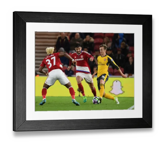 Framed Print : Middlesbrough vs Arsenal: Rob Holding Stands Firm Against Adama Traore and Antonio Barragan