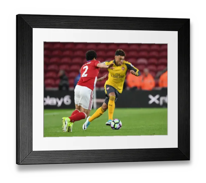 Framed Print : Arsenal's Alex Oxlade-Chamberlain Clashes with Middlesbrough's Fabio in Premier League Showdown Framed Print : Arsenal's Alex Oxlade-Chamberlain Clashes with Middlesbrough's Fabio in Premier League Showdown