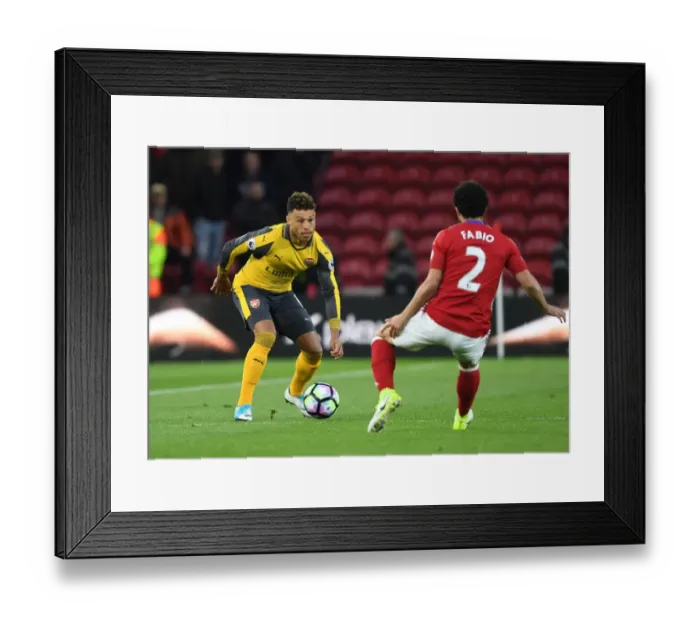 Framed Print : Clash at Riverside: Oxlade-Chamberlain vs Fabio in Premier League Showdown Framed Print : Clash at Riverside: Oxlade-Chamberlain vs Fabio in Premier League Showdown