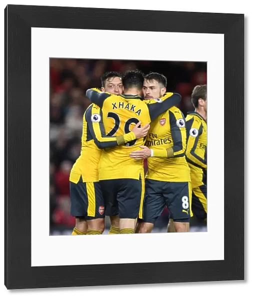 Arsenal's Triumph: Ozil, Xhaka, and Ramsey's Goal Celebration vs. Middlesbrough (2016-17)