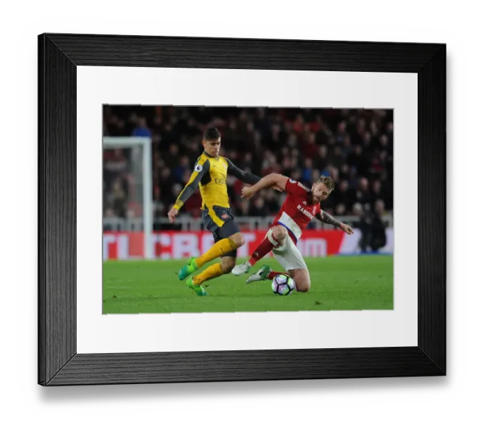 Framed Print : Gabriel vs. Adam Clayton: Intense Battle in Middlesbrough vs. Arsenal Premier League Clash