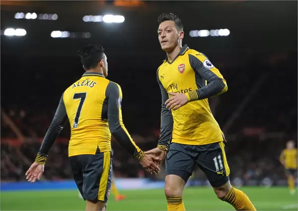 Mesut Ozil and Alexis Sanchez: A High-Fiving Moment at Middlesbrough's Riverside Stadium (Arsenal vs Middlesbrough, 2016-17)