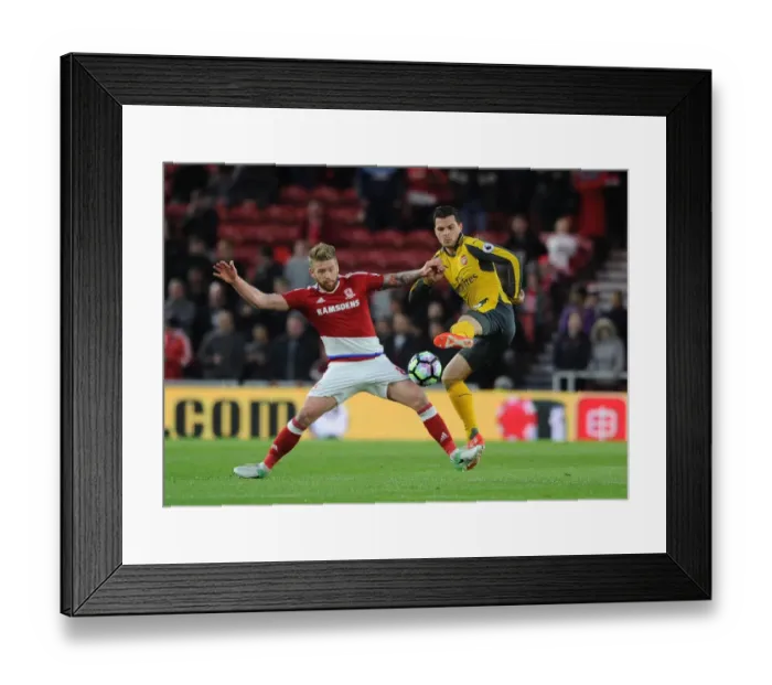 Framed Print : Xhaka vs. Clayton: Intense Clash in Middlesbrough vs. Arsenal Premier League Match Framed Print : Xhaka vs. Clayton: Intense Clash in Middlesbrough vs. Arsenal Premier League Match