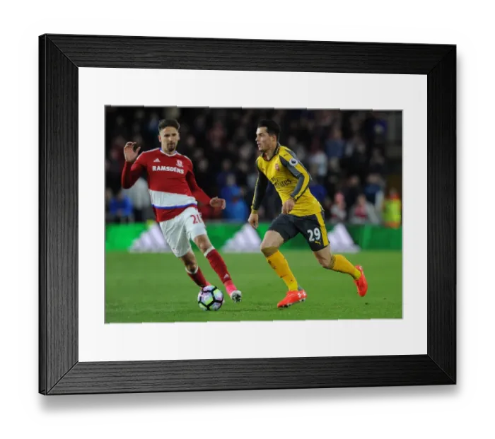 Framed Print : Xhaka vs. Ramirez: Intense Battle in Middlesbrough vs. Arsenal Premier League Clash Framed Print : Xhaka vs. Ramirez: Intense Battle in Middlesbrough vs. Arsenal Premier League Clash