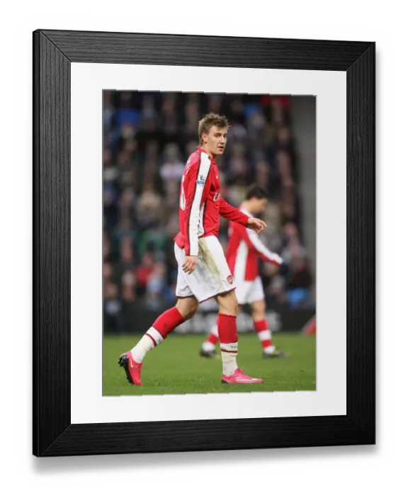 Framed Print : Nicklas Bendtner's Disappointing Day: Manchester City Crushes Arsenal 3-0 in the Premier League