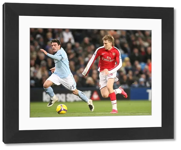 Nicklas Bendtner (Arsenal) Javier Garrido (Man City)