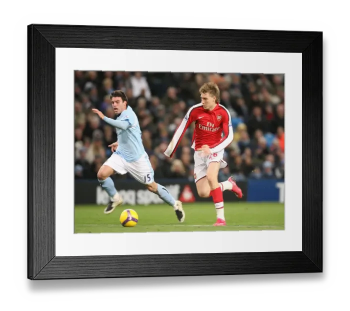 Framed Print : Nicklas Bendtner (Arsenal) Javier Garrido (Man City) Framed Print : Nicklas Bendtner (Arsenal) Javier Garrido (Man City)