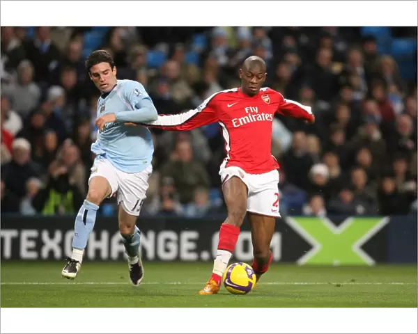 Abou Diaby (Arsenal) Javier Garrido (Man City)