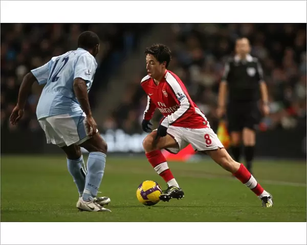 Manchester City's Double Strike: Nasri vs. Vassell in the 3:0 Rout of Arsenal