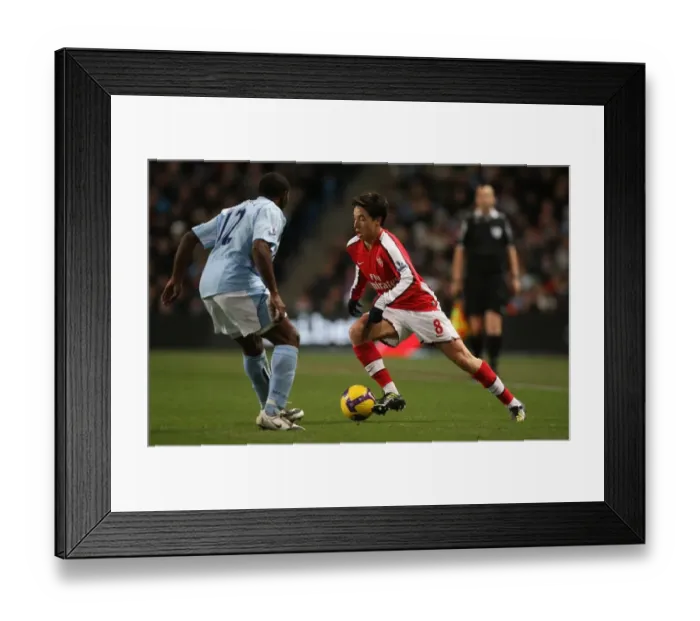Framed Print : Manchester City's Double Strike: Nasri vs. Vassell in the 3:0 Rout of Arsenal Framed Print : Manchester City's Double Strike: Nasri vs. Vassell in the 3:0 Rout of Arsenal