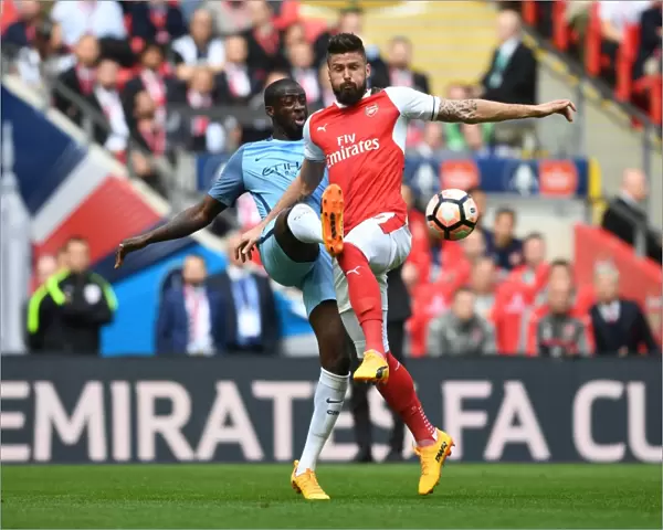 Clash of Titans: Olivier Giroud vs Yaya Toure - The Emirates FA Cup Semi-Final Showdown