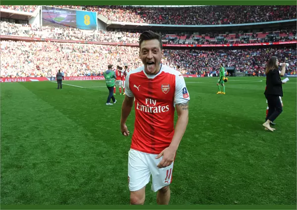 Mesut Ozil Celebrates Arsenal's FA Cup Semi-Final Victory over Manchester City