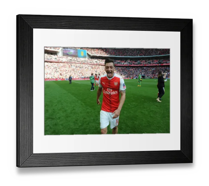 Framed Print : Mesut Ozil Celebrates Arsenal's FA Cup Semi-Final Victory over Manchester City Framed Print : Mesut Ozil Celebrates Arsenal's FA Cup Semi-Final Victory over Manchester City