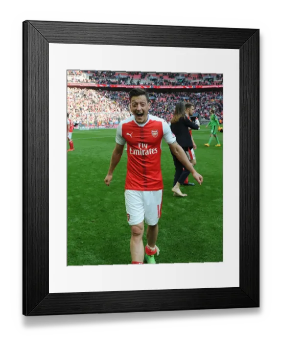 Framed Print : Mesut Ozil Celebrates Arsenal's FA Cup Semi-Final Victory Over Manchester City Framed Print : Mesut Ozil Celebrates Arsenal's FA Cup Semi-Final Victory Over Manchester City