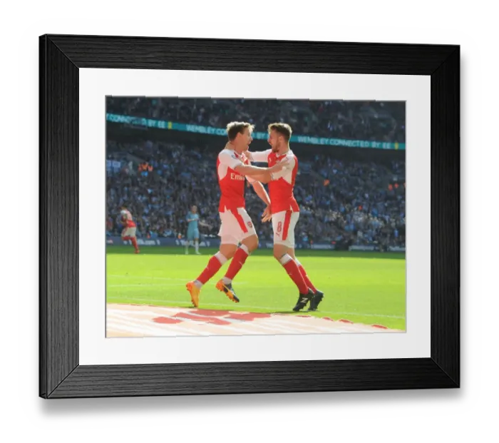 Framed Print : Monreal and Ramsey's Unforgettable FA Cup Semi-Final Goal Celebration: Arsenal's Victory Moment Against Manchester City Framed Print : Monreal and Ramsey's Unforgettable FA Cup Semi-Final Goal Celebration: Arsenal's Victory Moment Against Manchester City