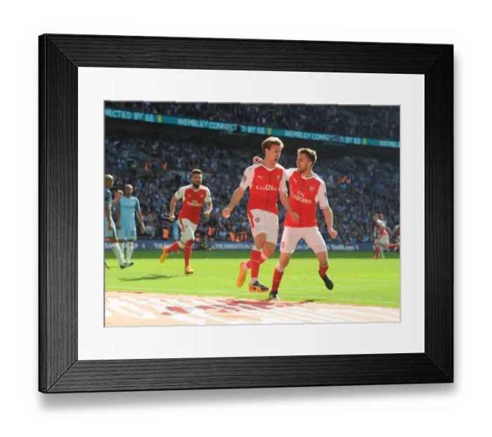 Framed Print : Monreal and Ramsey's Thrilling FA Cup Semi-Final Goal Celebration: Arsenal's Unforgettable Moment Against Manchester City Framed Print : Monreal and Ramsey's Thrilling FA Cup Semi-Final Goal Celebration: Arsenal's Unforgettable Moment Against Manchester City