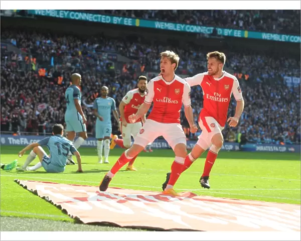 Monreal and Ramsey's Thrilling Goal Celebration: Arsenal's FA Cup Semi-Final Victory Over Manchester City