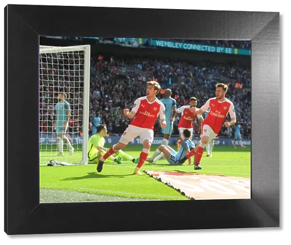 Monreal and Ramsey Celebrate Arsenal's FA Cup Semi-Final Goal Against Manchester City