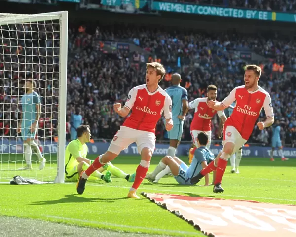Monreal and Ramsey Celebrate Arsenal's FA Cup Semi-Final Goal Against Manchester City