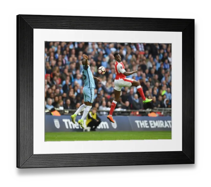 Framed Print : Clash at Wembley: Welbeck Leaps Over Fernandinho in FA Cup Semi-Final Showdown (Arsenal vs Manchester City)