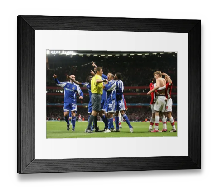 Framed Print : Dynamo Kyiv players protest the Arsenal goal as Nicklas