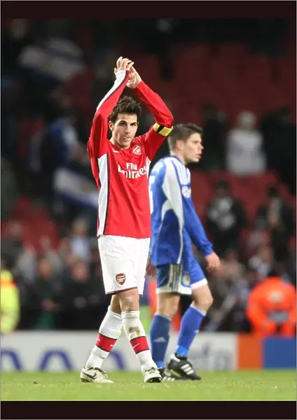 Arsenal captain Cesc Fabregas applauds the fans after the match