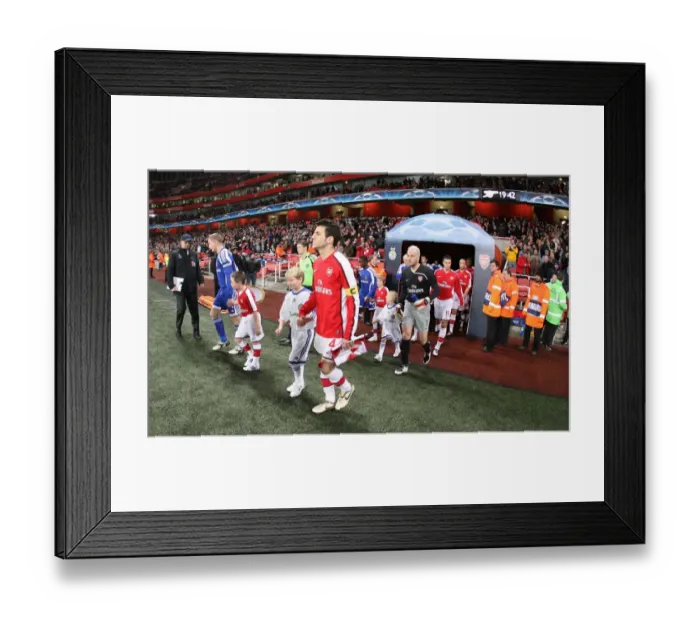 Framed Print : Arsenal captain Cesc Fabregas leads the team out for the first time Framed Print : Arsenal captain Cesc Fabregas leads the team out for the first time