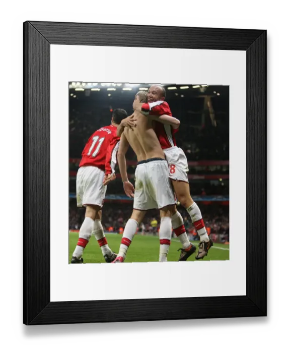 Framed Print : Mikael Silvestre celebrate with goalscorer Nicklas Bendtner Framed Print : Mikael Silvestre celebrate with goalscorer Nicklas Bendtner