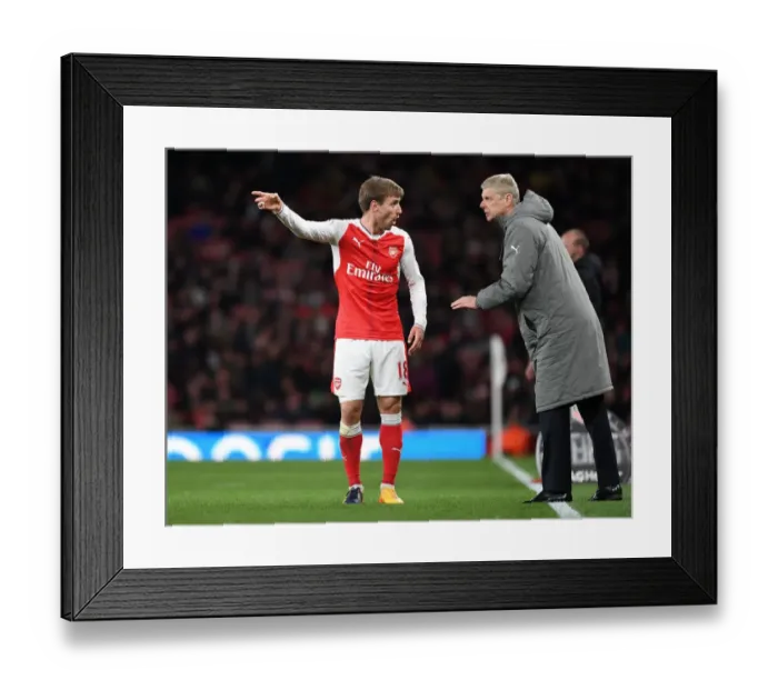 Framed Print : Arsene Wenger Consults Nacho Monreal during Arsenal's Clash against Leicester City (2016-17) Framed Print : Arsene Wenger Consults Nacho Monreal during Arsenal's Clash against Leicester City (2016-17)