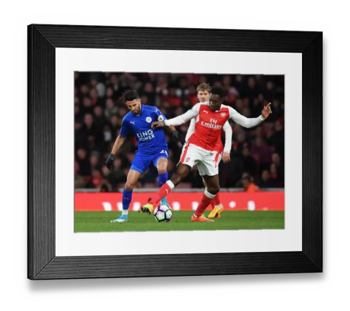 Framed Print : Clash of Stars: Welbeck vs Mahrez in Arsenal vs Leicester Premier League Showdown Framed Print : Clash of Stars: Welbeck vs Mahrez in Arsenal vs Leicester Premier League Showdown