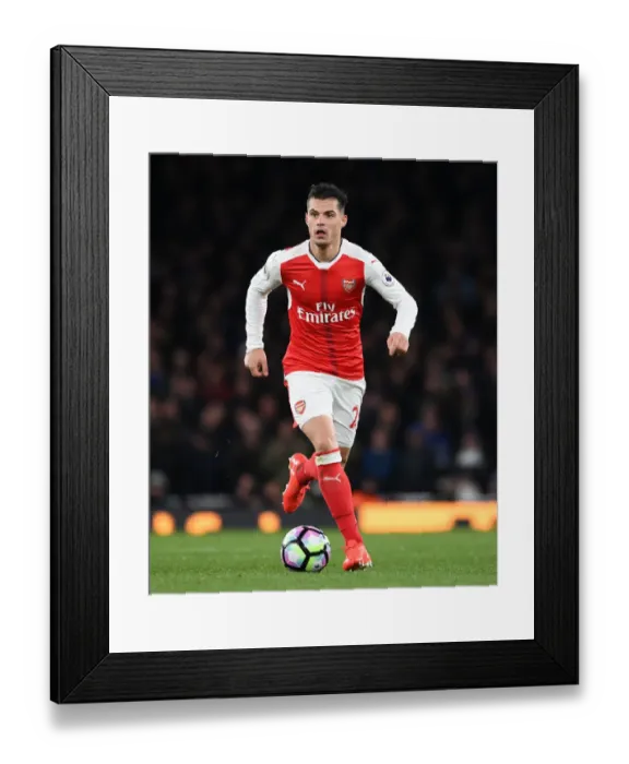 Framed Print : Granit Xhaka: Arsenal's Midfield Mastermind in Action vs. Leicester City, Premier League 2016-17 Framed Print : Granit Xhaka: Arsenal's Midfield Mastermind in Action vs. Leicester City, Premier League 2016-17