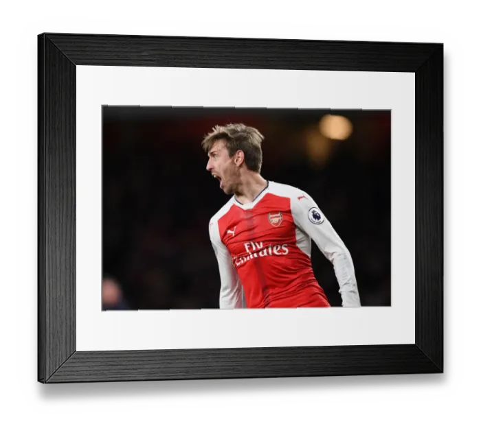 Framed Print : Nacho Monreal's Euphoric Moment: Arsenal's Game-Changing Goal vs. Leicester City (2016-17)