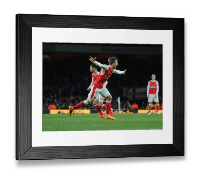 Framed Print : Nacho Monreal Celebrates Arsenal's Goal Against Leicester City (2016-17) Framed Print : Nacho Monreal Celebrates Arsenal's Goal Against Leicester City (2016-17)