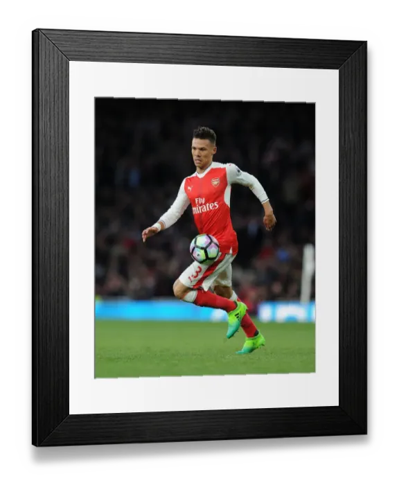 Framed Print : Arsenal's Kieran Gibbs in Action Against Leicester City (2016-17) Framed Print : Arsenal's Kieran Gibbs in Action Against Leicester City (2016-17)