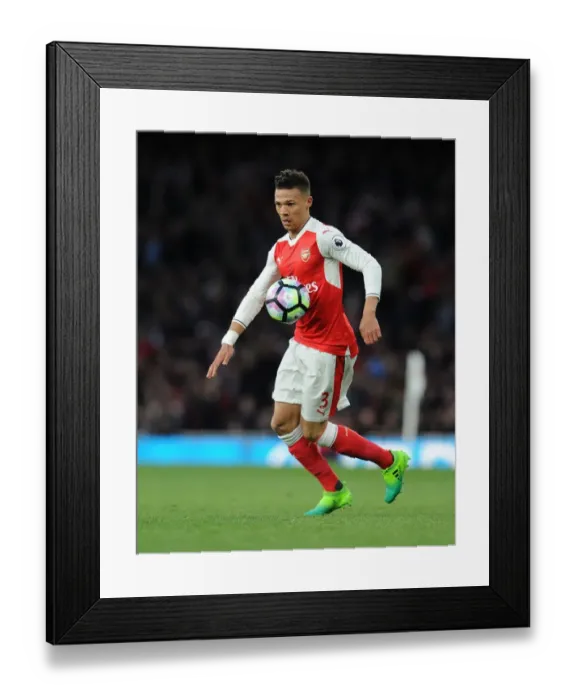 Framed Print : Arsenal's Kieran Gibbs in Action Against Leicester City (2016-17) Framed Print : Arsenal's Kieran Gibbs in Action Against Leicester City (2016-17)