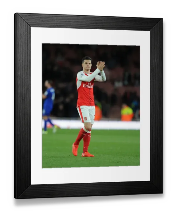 Framed Print : Arsenal's Granit Xhaka Celebrates with Fans after Arsenal v Leicester City Match Framed Print : Arsenal's Granit Xhaka Celebrates with Fans after Arsenal v Leicester City Match