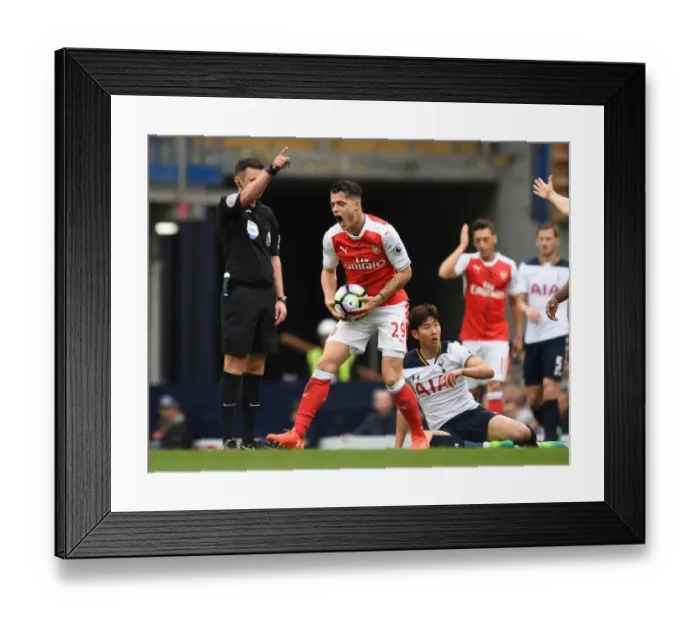 Framed Print : Xhaka's Reaction: Ref Calls Foul on Son during Tottenham vs Arsenal Clash