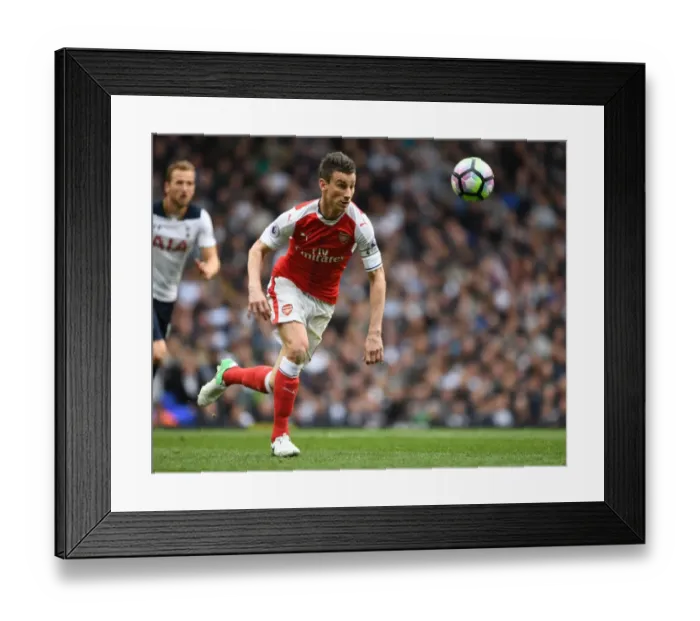 Framed Print : Laurent Koscielny: Arsenal's Defensive Wall in the Battle of North London (Tottenham Hotspur vs Arsenal, Premier League 2016-17)