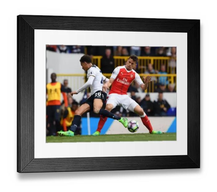 Framed Print : Gabriel vs Dele Alli: Intense Tackle in the Premier League Showdown between Arsenal and Tottenham Framed Print : Gabriel vs Dele Alli: Intense Tackle in the Premier League Showdown between Arsenal and Tottenham
