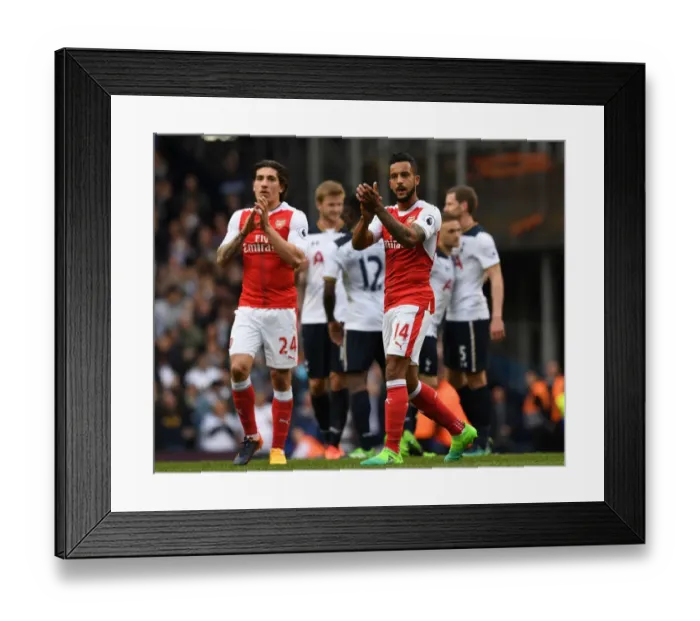 Framed Print : Arsenal Players Hector Bellerin and Theo Walcott Celebrate with Fans after Tottenham Victory Framed Print : Arsenal Players Hector Bellerin and Theo Walcott Celebrate with Fans after Tottenham Victory