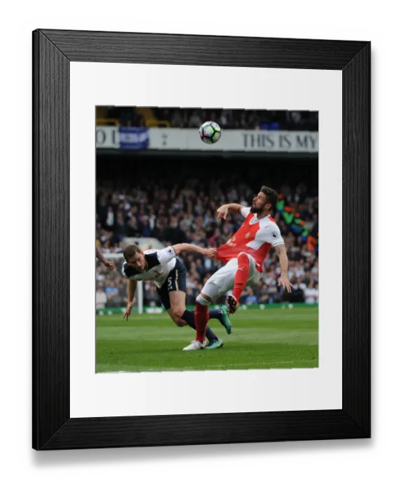 Framed Print : Giroud vs Vertonghen: Intense Rivalry in the Premier League Clash between Tottenham and Arsenal Framed Print : Giroud vs Vertonghen: Intense Rivalry in the Premier League Clash between Tottenham and Arsenal