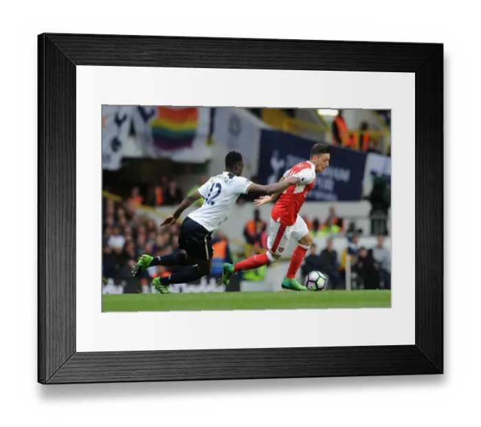 Framed Print : Mesut Ozil vs. Victor Wanyama: Battle in the Premier League between Arsenal and Tottenham