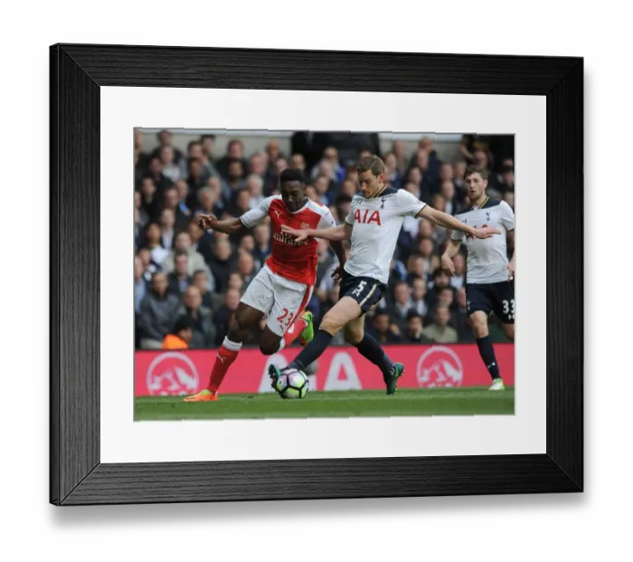 Framed Print : Danny Welbeck vs. Jan Vertonghen: Intense Battle in the Premier League Clash Between Tottenham and Arsenal Framed Print : Danny Welbeck vs. Jan Vertonghen: Intense Battle in the Premier League Clash Between Tottenham and Arsenal