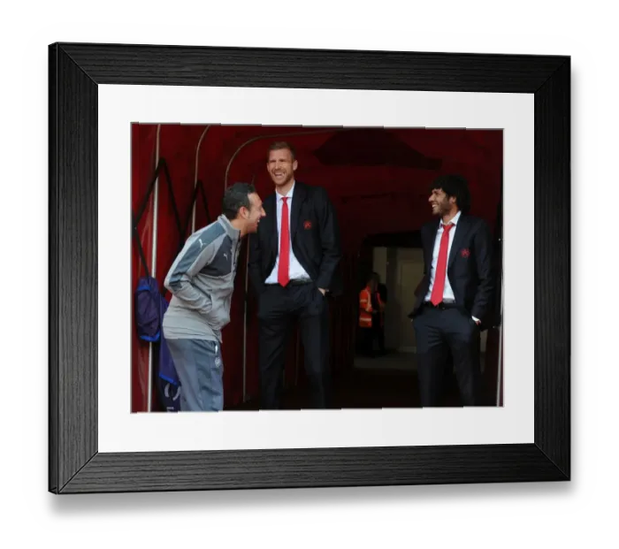 Framed Print : Arsenal Triple Threat: Cazorla, Mertesacker, and Elneny's Light-Hearted Moment in the Tunnel Before Arsenal vs. Manchester United (2016-17) Framed Print : Arsenal Triple Threat: Cazorla, Mertesacker, and Elneny's Light-Hearted Moment in the Tunnel Before Arsenal vs. Manchester United (2016-17)